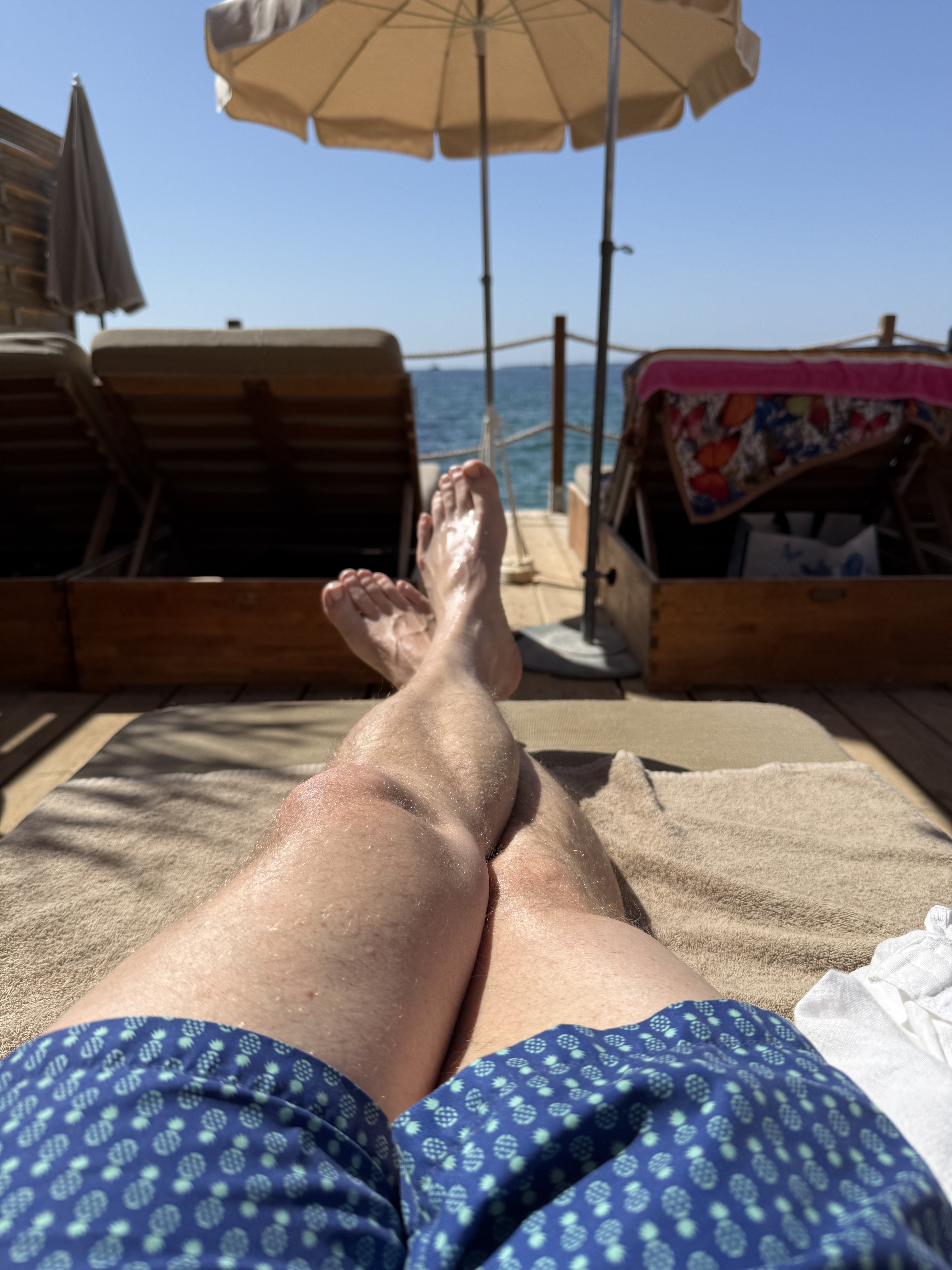Reclining on beach lounger, Mediterranean sea